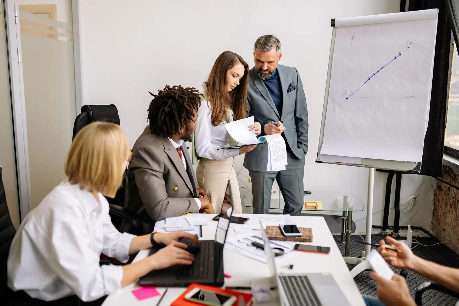 A sales leader working through a deal with the team